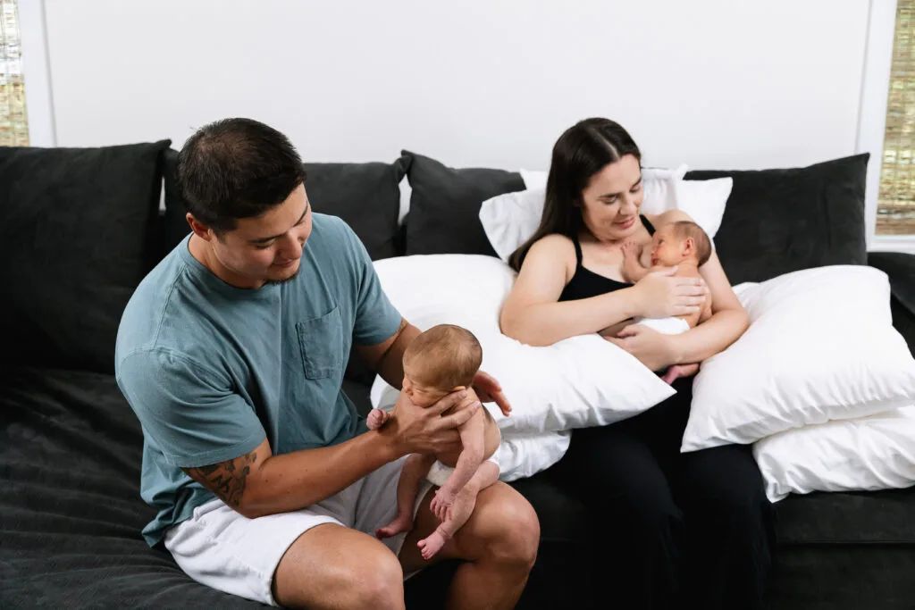 Mother and father with babies