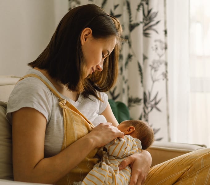 Mother breastfeeding baby