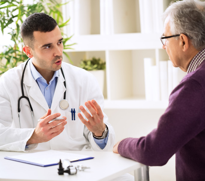 Doctor conversing with patient
