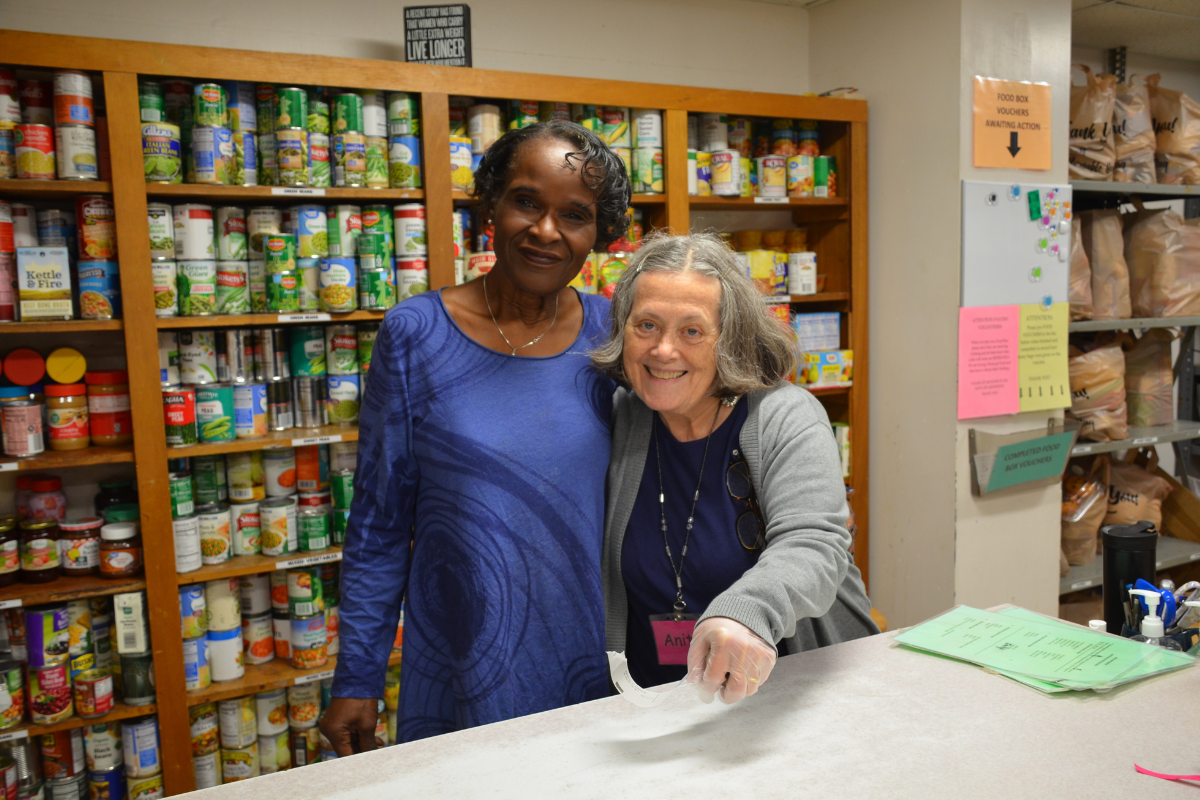 Two women smiling working
