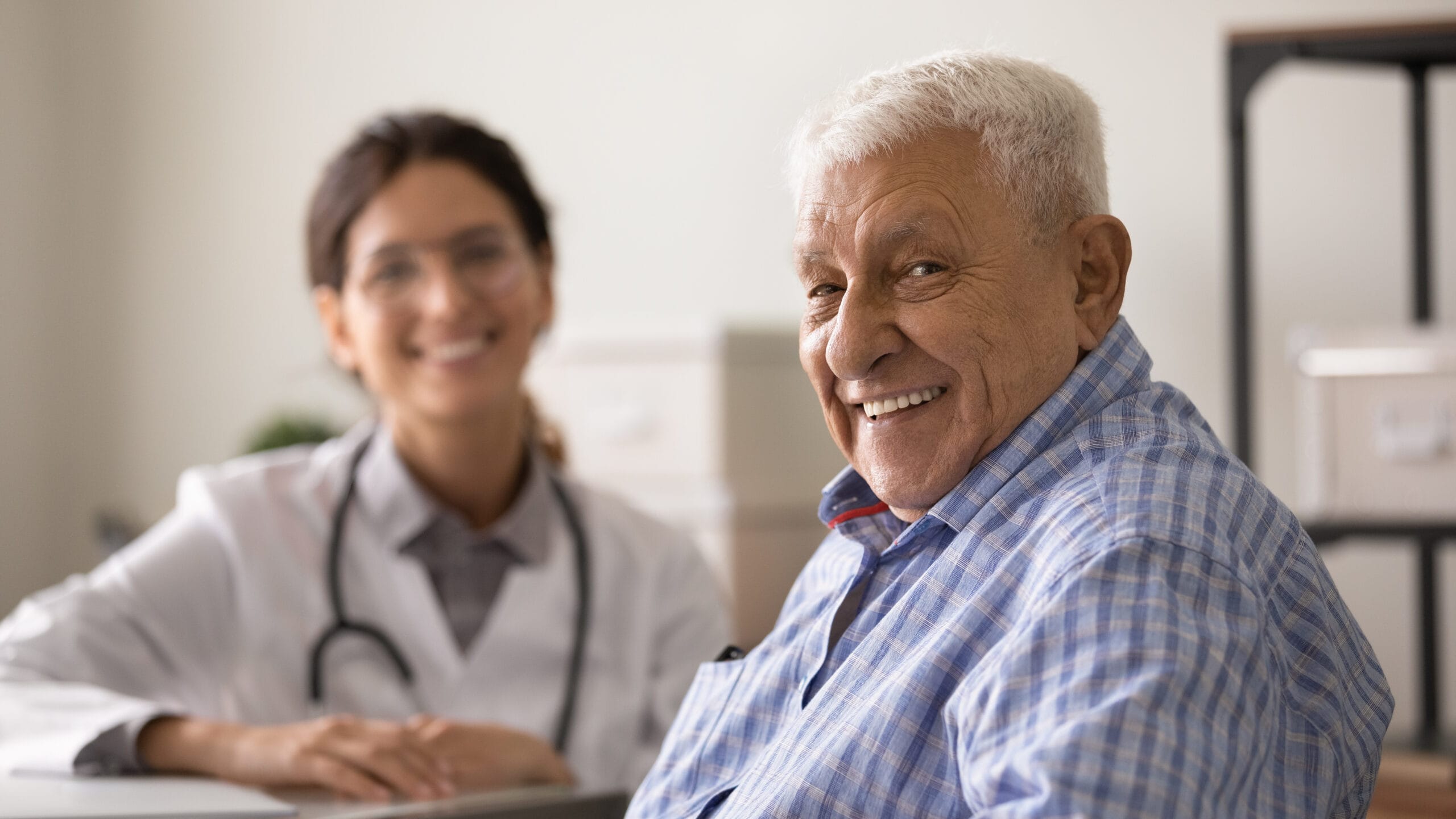 Image of smiling doctor and patient because of Improvement in healthcare quality